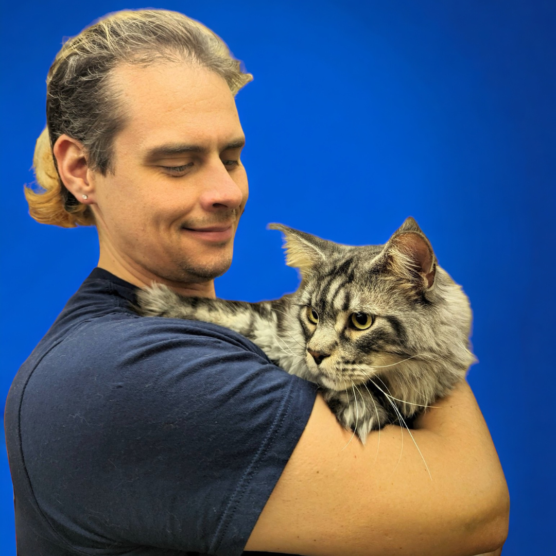 Chris with Maine Coon